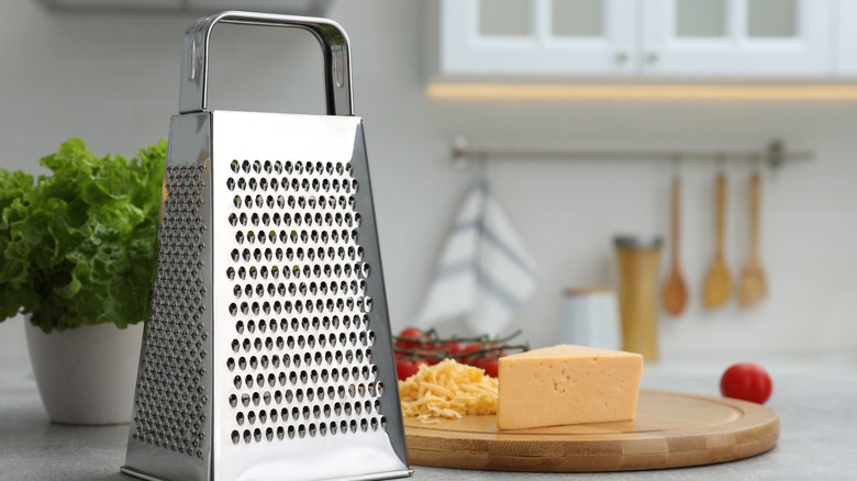 Cheese grater with cheddar
