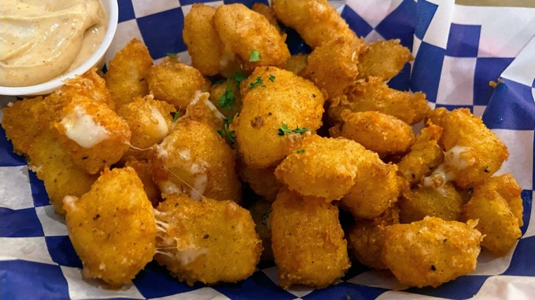 Fried cheese curds in a basket