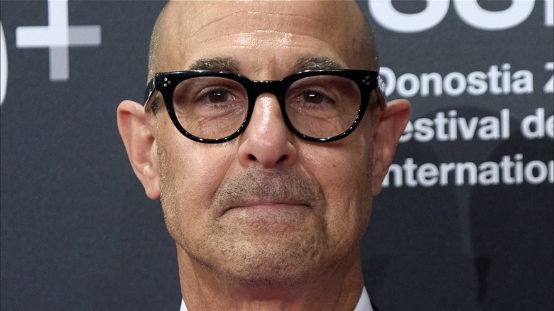 Stanley Tucci wearing glasses