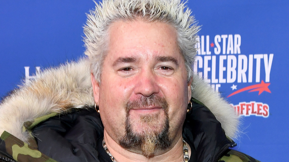 Guy Fieri in a puffer coat