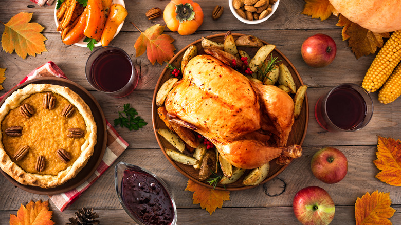 turkey and sides spread out in Thanksgiving array