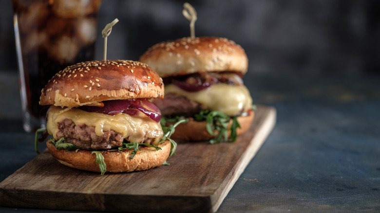 burgers with cheese and caramelized onion