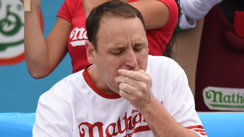 Joey Chestnut eating hot dogs 