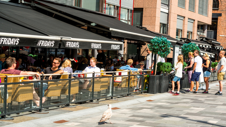 People enjoying lunch outdoors at TGI Fridays