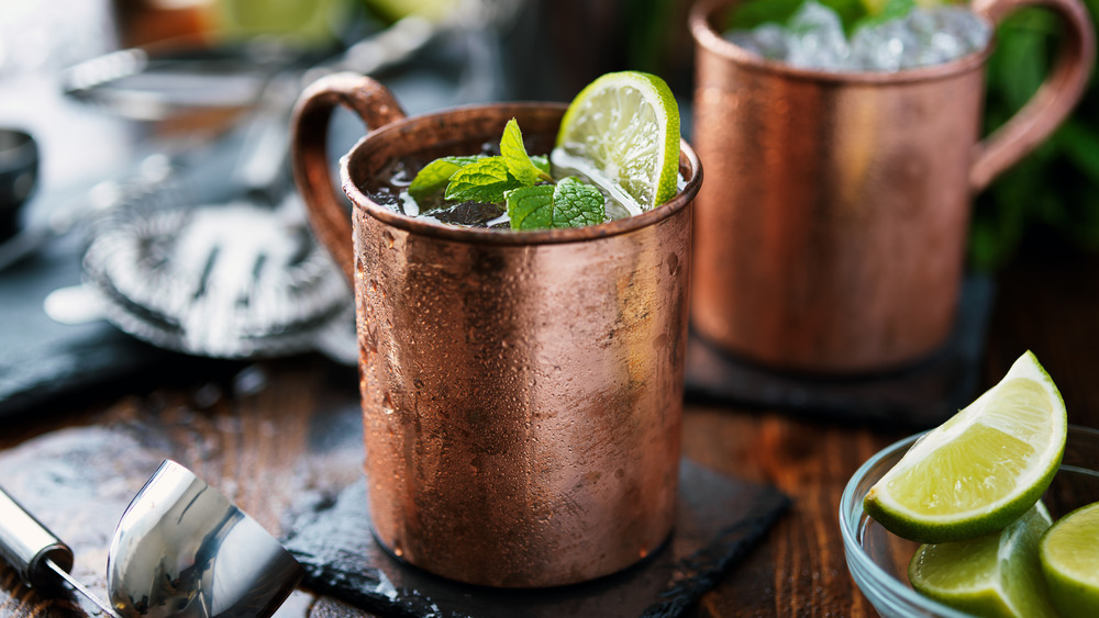 two moscow mules in copper mugs