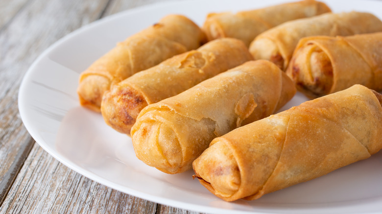 egg rolls on white plate