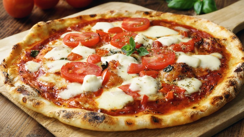 pizza with cheese and tomatoes