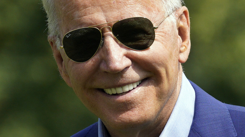 President Joe Biden wearing suit and sunglasses