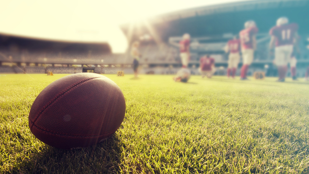 Football and players on the field 