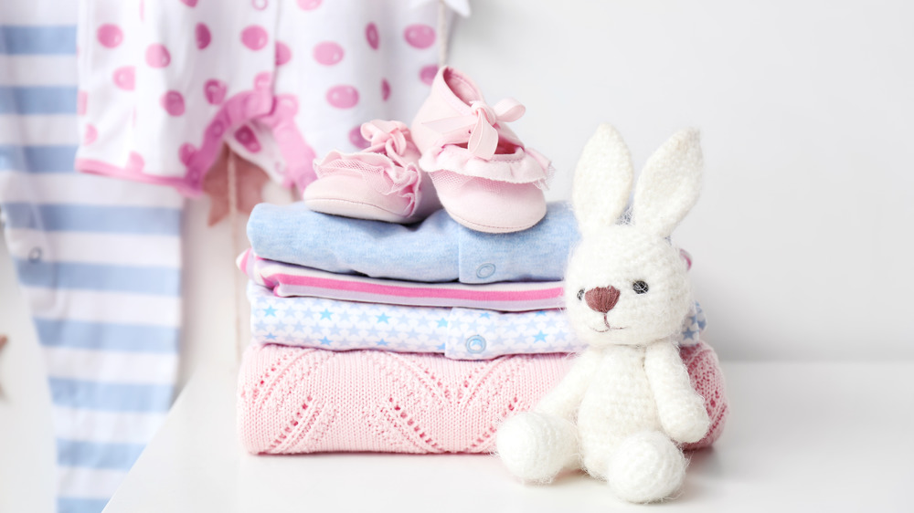 Stack of baby clothes