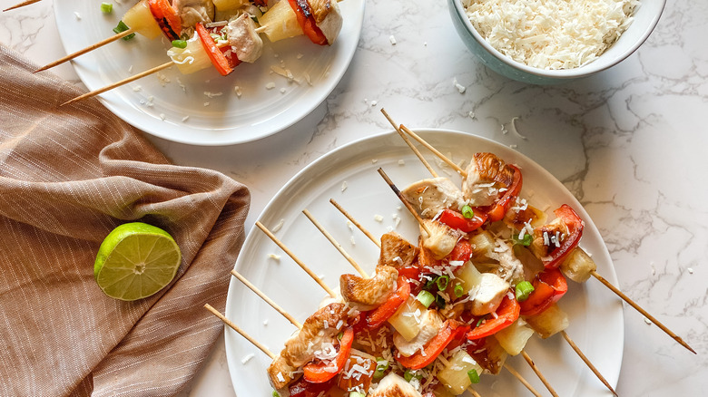 chicken skewers on a plate