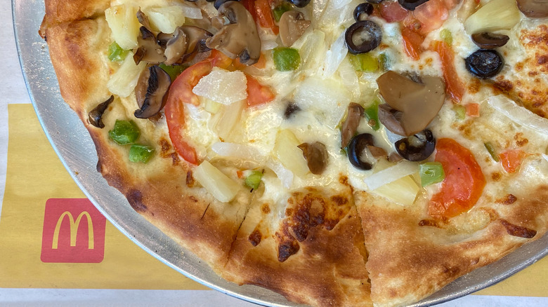Pizza on a McDonald's tray