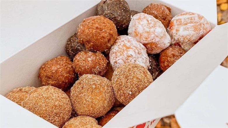 pumpkin donut holes in a box