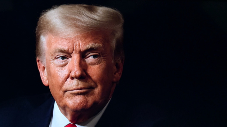 Donald Trump against a black background