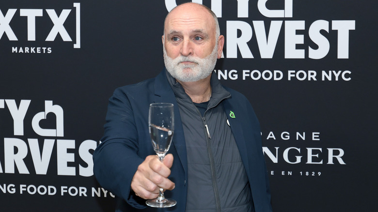 Chef José Andrés with a flute of champagne