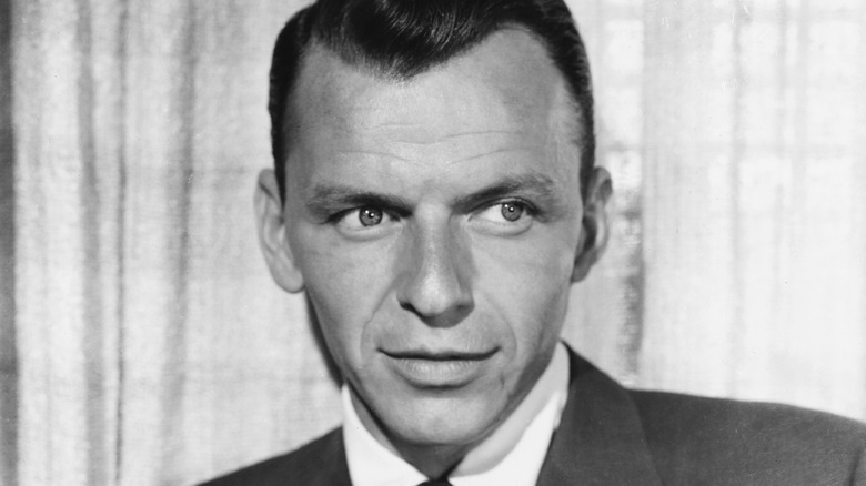 Black and white photo of Frank Sinatra looking to the side