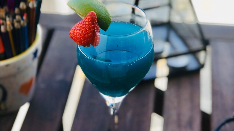 blue mocktail with strawberry