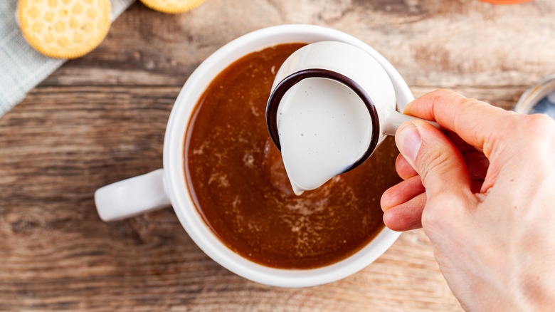 Half and half poured into coffee