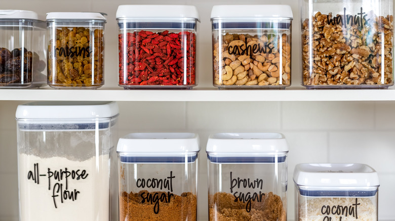 Pantry shelf filled with clear containers