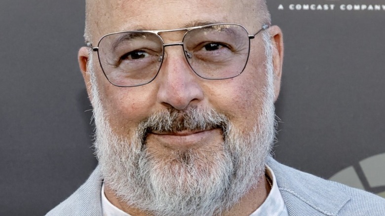 Andrew Zimmern wearing glasses