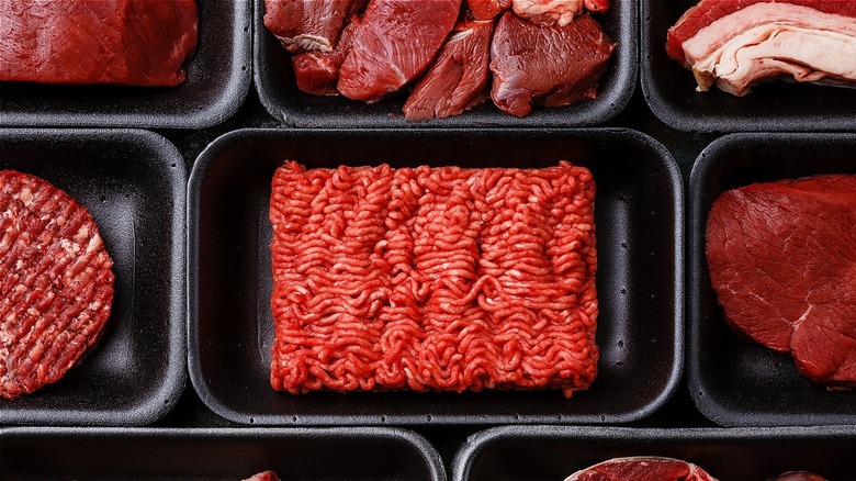 beef in black styrofoam trays