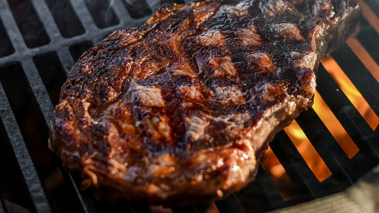 Rib eye steak on a grill