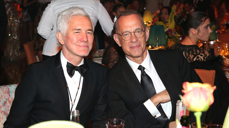 Tom Hanks and Baz Luhrmann at a party