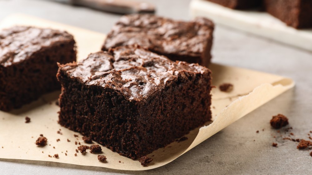 chocolate brownies on parchment paper