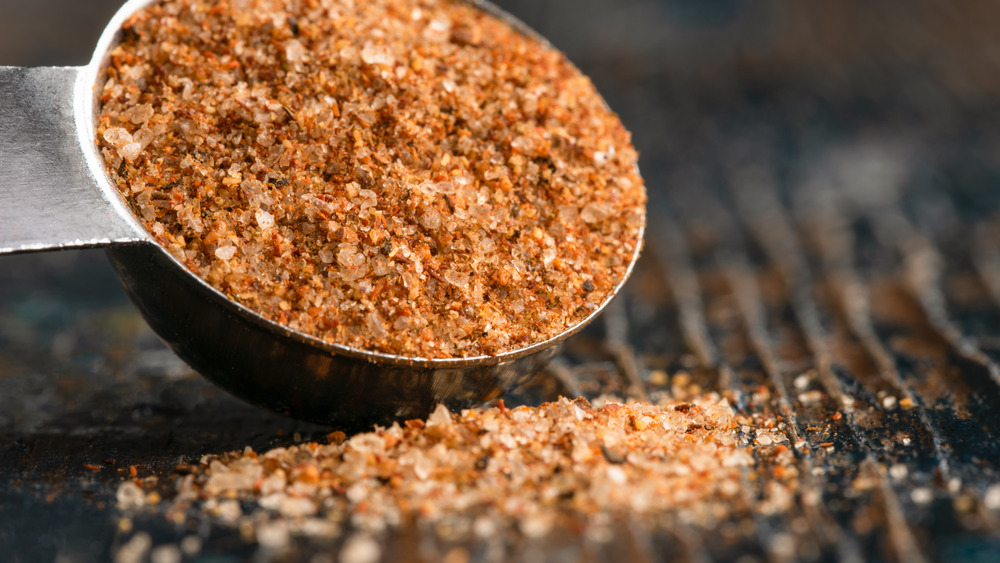 Cajun seasoning spilled out of measuring spoon