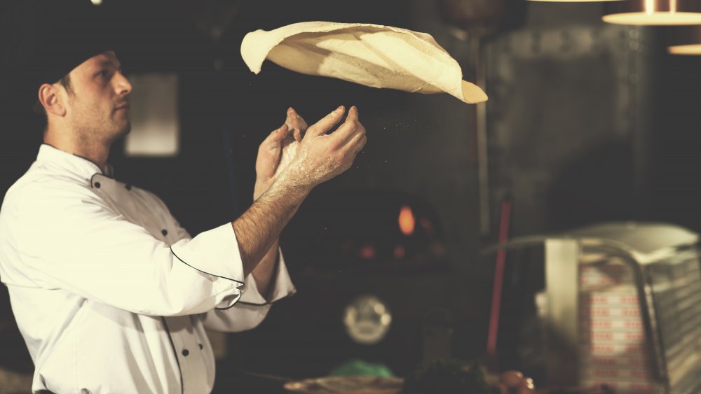 Man making pizza