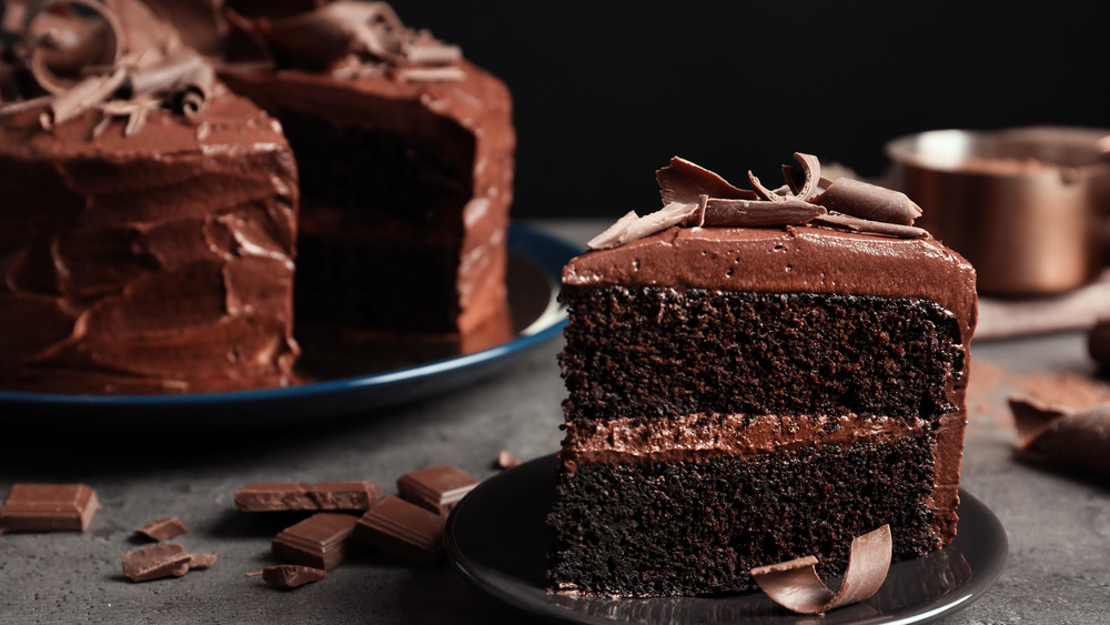 Slice of rich, dark chocolate cake