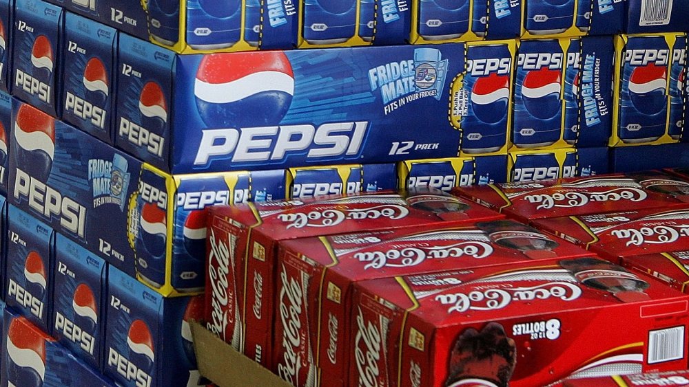 boxes of pepsi and coca-cola