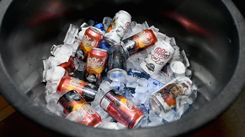 Cans of Dr. Pepper on ice