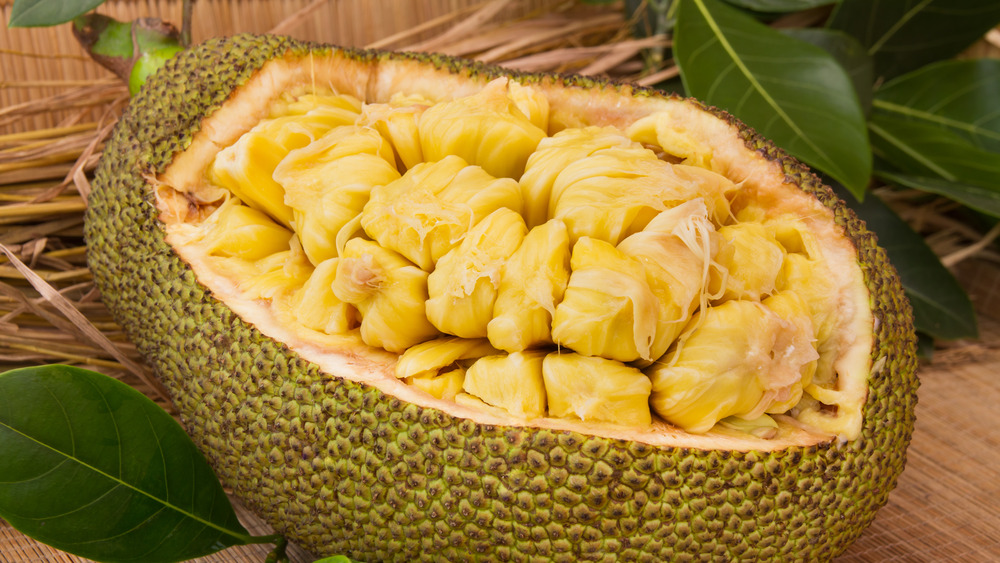 Open jackfruit showing interior bulbs