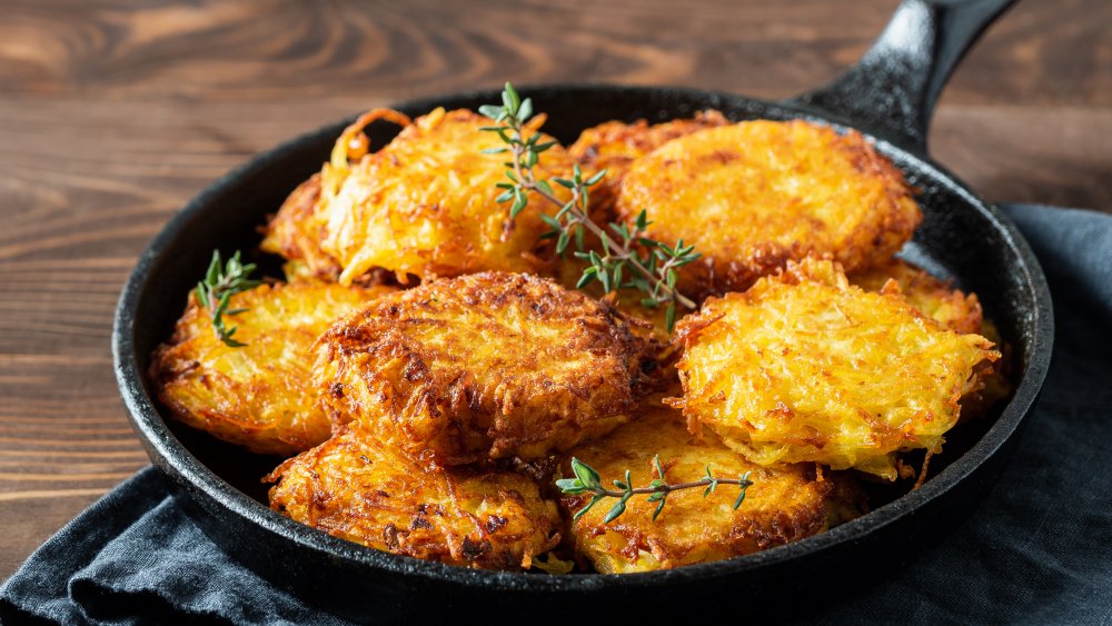 hash browns in an iron skillet