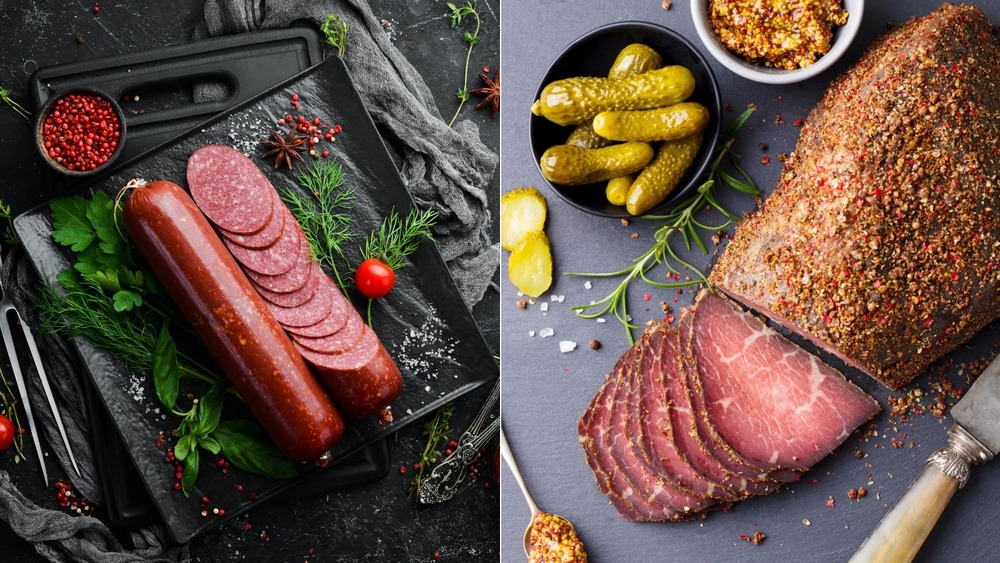 Salami and pastrami on cutting board