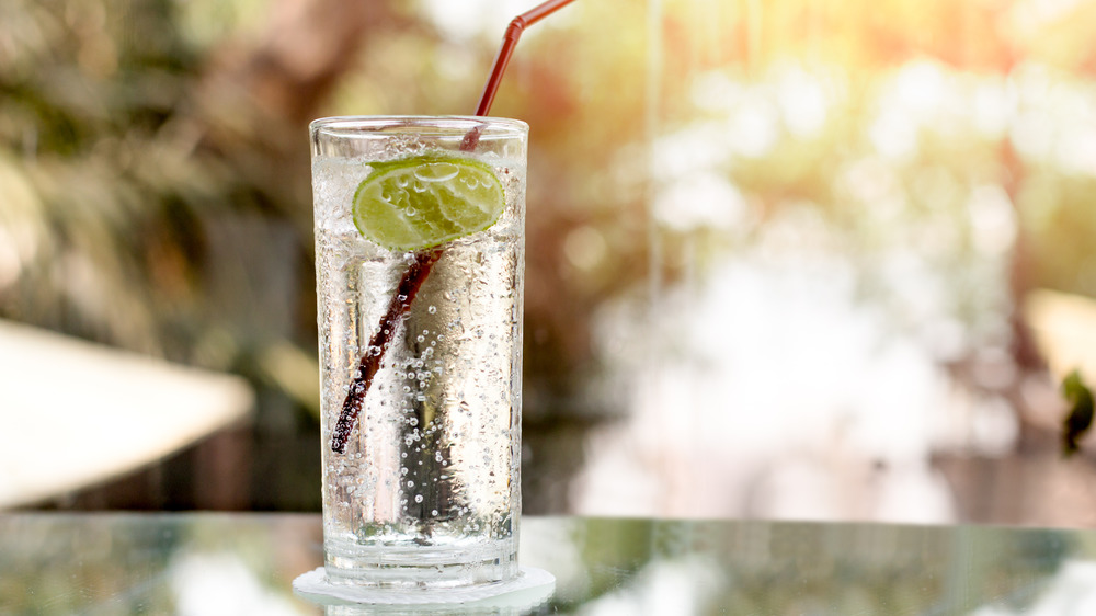 Glass of seltzer with lime