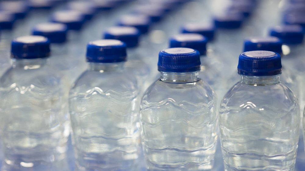 plastic water bottles in neat rows
