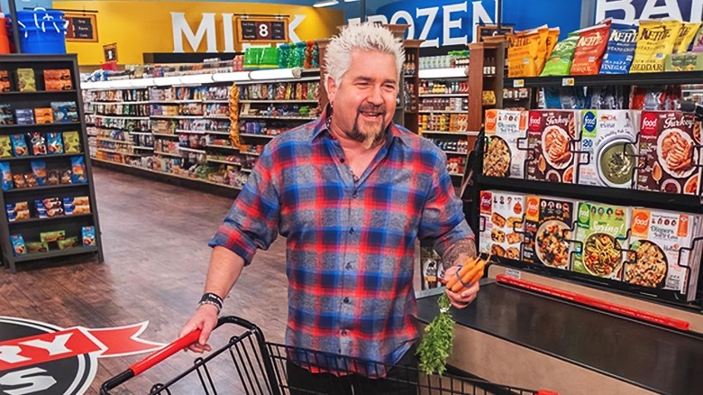 guy fieri shopping on a grocery store set