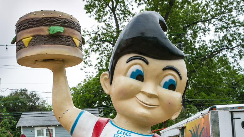 Big Boy Restaurants mascot holding hamburger