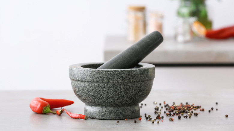 Gray stone mortar and pestle