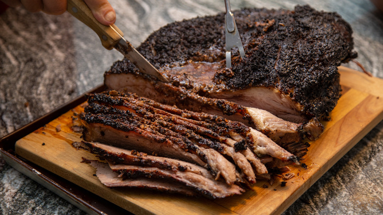 Beef brisket being cut