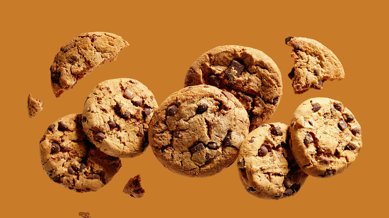 Chocolate chips on an orange background