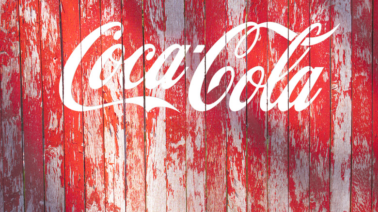 Paint peeling Coca-Cola sign