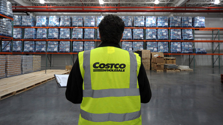 An employee at a Costco outlet