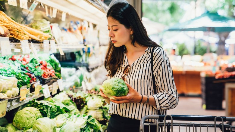 woman shopping for grocery store produce