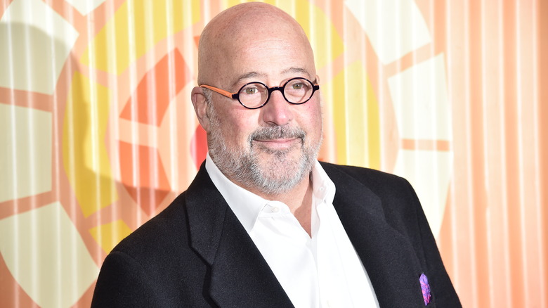 Andrew Zimmern smiling