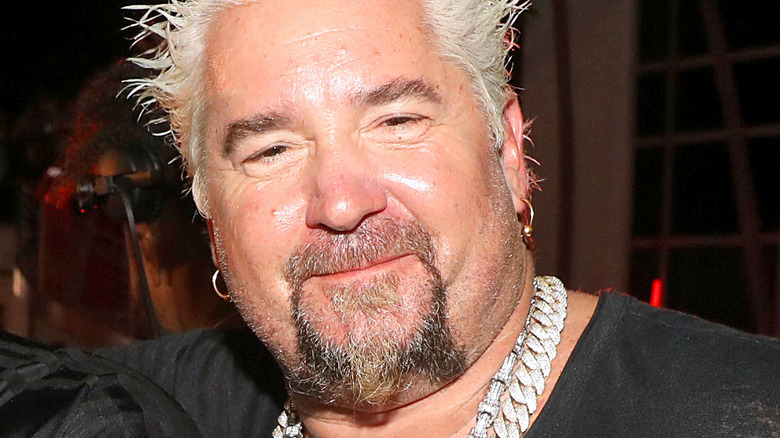 Guy Fieri with slight smile