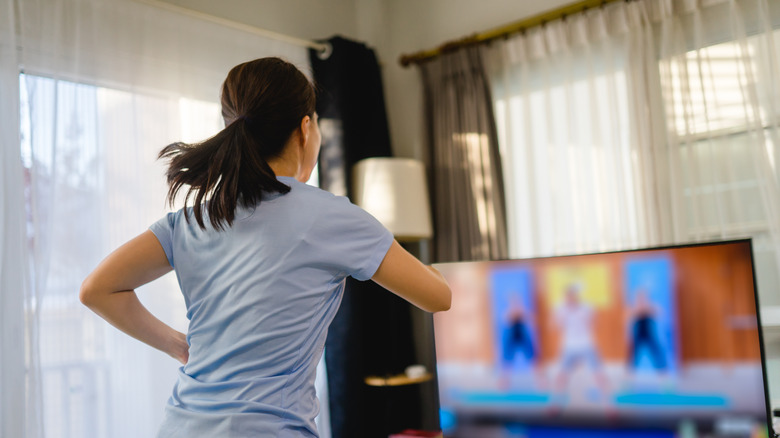 Woman exercising indoors