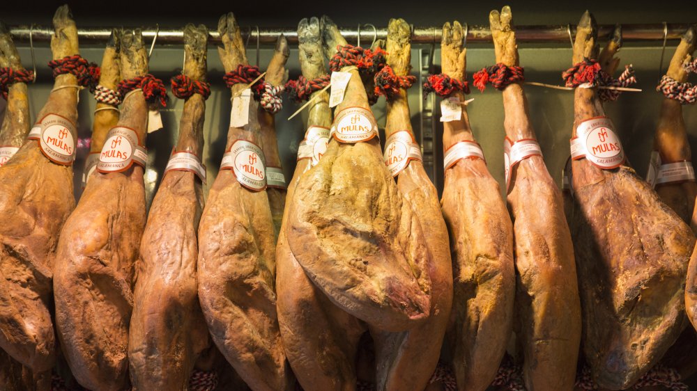 Iberico ham legs hanging 